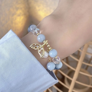 Elegant ocean blue beaded mermaid tail bracelet with crystal accents and pearls