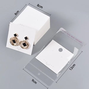 Detail of 8x8cm white jewelry display cards with 9x12cm OPP bags for earrings