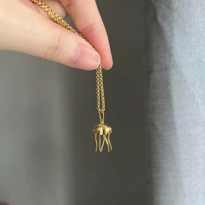 Golden jellyfish pendant necklace with sparkling diamonds and natural baroque pearls