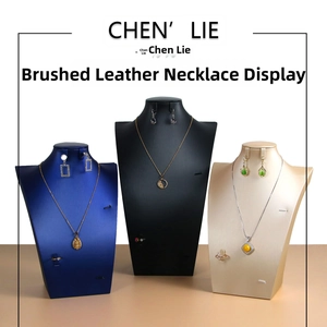 Three multi-color brushed leather mannequin jewelry displays for necklaces and earrings