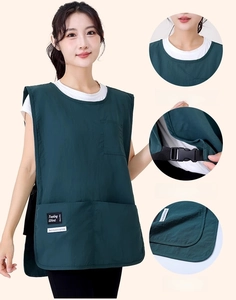 Detail view of adjustable side buckle and reinforced stitching on waterproof apron vest