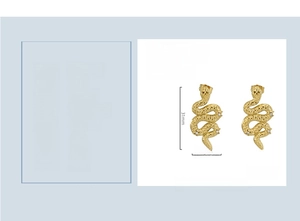 Macro detail of gold 18K plated stainless steel snake earrings with sparkling rhinestones