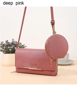 Detail of deep pink long wallet bag with detachable coin purse and gold zipper