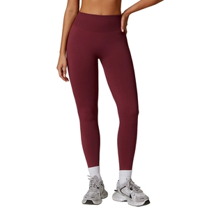 High-waist seamless burgundy leggings with ribbed compression waistband for fitness