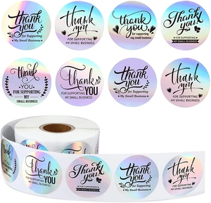 Macro view of holographic rainbow thank you stickers roll for small business packaging