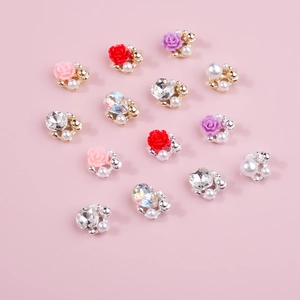 Elegant 3D camellia flower nail charms with pearls and crystals on gold and silver base