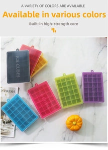 Detailed view of colorful 24-grid silicone ice cube molds with transparent ICE CUBES lids