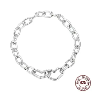 Minimalist S925 sterling silver interlocking heart chain bracelet on white background