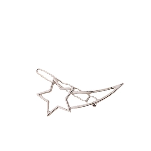 Macro shot of silver metal star hair clip showing hollow cutout and wing-like structure