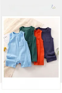 Detailed view of four colorful striped cotton baby rompers with snap button design