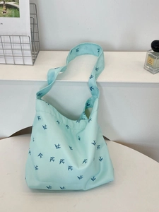 Sac fourre-tout en toile bleu menthe avec imprimés oiseaux bleu marine et anses robustes