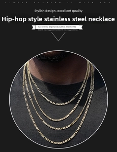 Detailed view of layered 3mm gold stainless steel Figaro chains for hip hop fashion