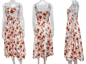 Detail view of backless floral sundress with red rose print and thin shoulder straps