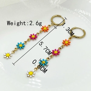 Detail shot of colorful daisy tassel earrings in stainless steel with measurement data