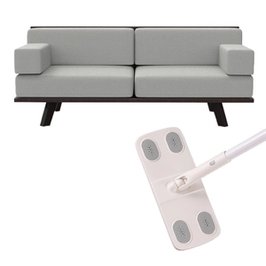 Flat static mop with slim head for gap cleaning under grey fabric sofa furniture