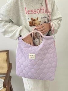 Lavender quilted heart tote bag with pink handles and adjustable shoulder strap for women