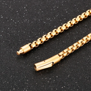 Detail of 18k gold plated stainless steel box chain necklace with spring clasp
