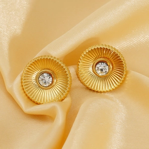 Vintage gold plated titanium earrings with sunburst texture and center zircon stone