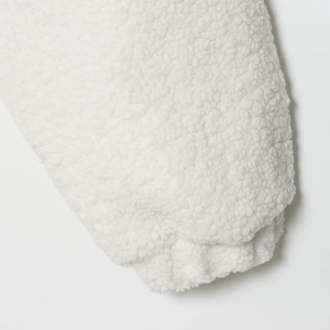White teddy fleece jacket with high collar and warm shearling texture for women