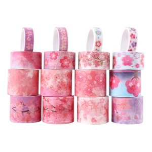 Detail view of 12 rolls pink floral washi tape set with gold foil cherry blossom patterns