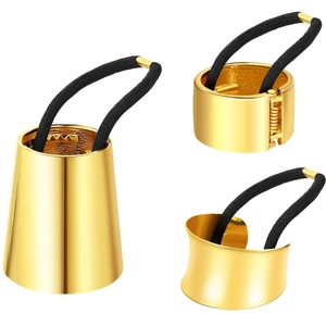 Three-piece gold metal ponytail cuff set with elastic hair ties on a white background