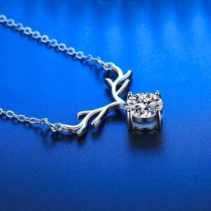 Silver elk antler necklace with a round sparkling moissanite stone for women