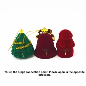 Rear view of velvet Christmas tree, bell, and Santa Claus jewelry boxes with hinge details