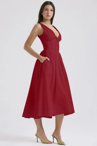Detail of burgundy V-neck maxi dress with cinched waist and side pockets for summer