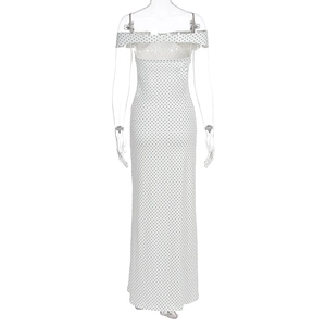 Detailed back view of off-shoulder white polka dot dress with elastic fabric texture