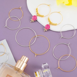 DIY gold and silver hoop earring findings with pink lollipop charms and beads