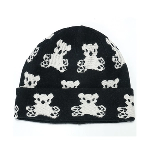 Cute black beanie with white bear jacquard patterns and a folded cuff for winter