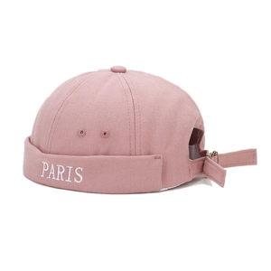 Pink canvas docker hat with white PARIS embroidery and adjustable back strap for street style