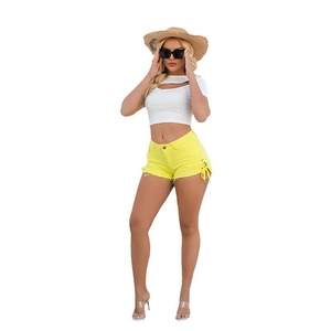 Summer yellow high-waisted denim shorts with side lace-up design for women fashion