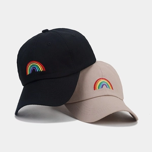 Black and beige cotton baseball caps featuring vibrant rainbow embroidery details