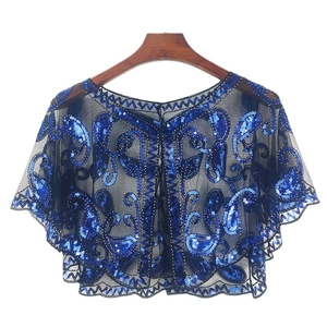 Blue sheer mesh shawl with sequins and beadwork embroidery hanging on a wooden hanger