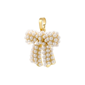 Exquisite gold bow pendant with white pearls and tassels on a clean white background