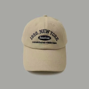 Detail of 1989 New York embroidery and stitching on a khaki vintage cotton baseball cap