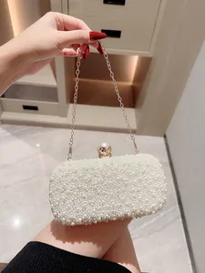 Elegant white pearl clutch evening bag with gold chain strap for formal party and wedding