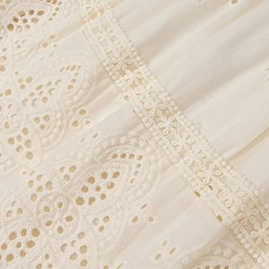 Lace patchwork cream two-piece set featuring intricate embroidery and hollow patterns