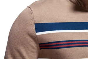 Close-up of striped knit sweater shoulder showing fine stitching and multi-color texture