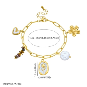 Baroque pearl and heart charm gold-plated bracelet with flower and tiger eye stones