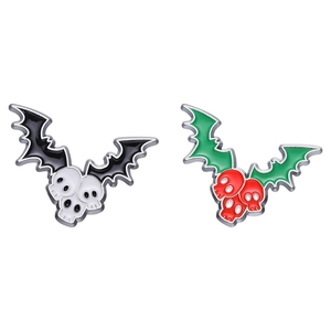 Halloween skull badges with wings in black and green enamel finish for costumes