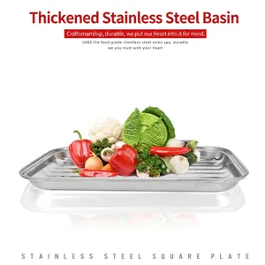 Durable stainless steel square BBQ tray for camping, filled with fresh vegetables