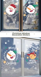 Detailed Christmas window stickers with Santa, snowman and reindeer on glass surfaces