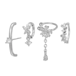 Detail view of silver floral zircon earrings set including ear cuffs and studs
