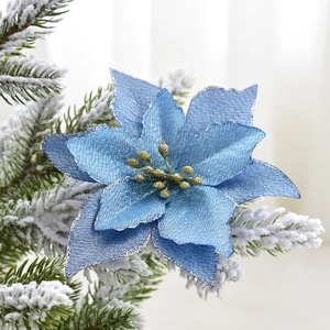 Blue 13cm glitter poinsettia artificial flower on snowy pine branch Christmas decor