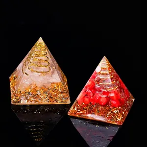 Orgone energy pyramid with natural crystals and copper coil for office decoration