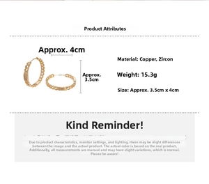Detailed view of 18k gold plated hoop earrings featuring woven texture and cubic zirconia