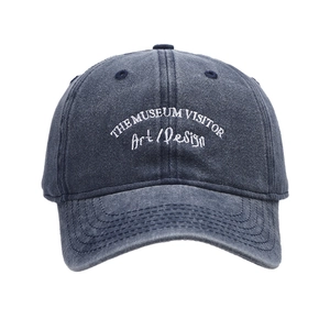 Unisex navy blue washed cotton baseball cap with The Museum Visitor embroidery