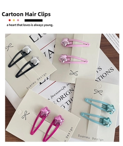 Set of colorful metallic star hair clips for girls in blue pink and black finishes